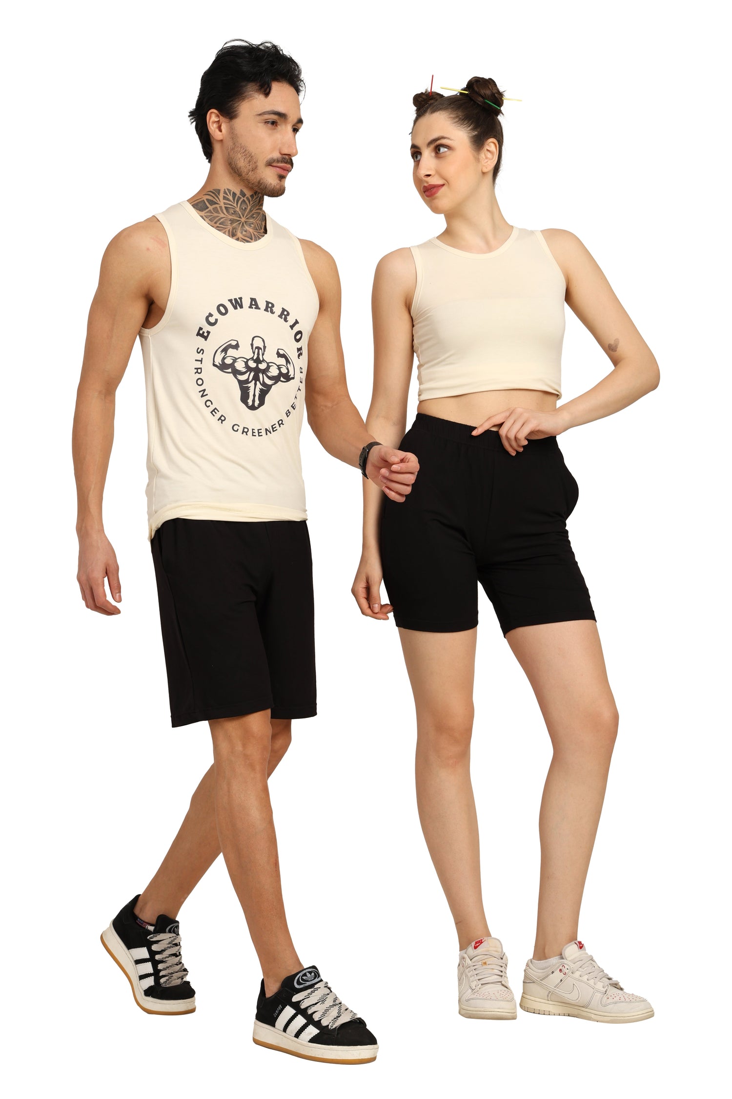 Stylish activewear collection featuring a man and woman in sporty outfits, perfect for workouts and fitness activities.