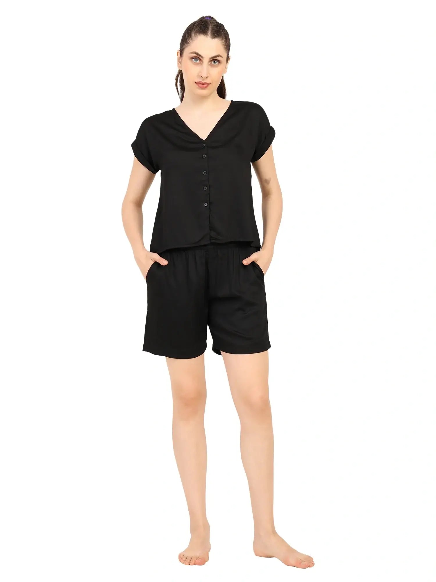 Women’s modal satin night suit in black with short sleeves and shorts, perfect for sleep or lounging.