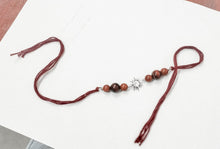 Load image into Gallery viewer, Handmade Sustainable Healing Beads Rakhi | Sunstone &amp; Red Tiger Eye | Sun Charm
