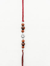 Load image into Gallery viewer, Handmade Sustainable Healing Beads Rakhi | Sunstone &amp; Red Tiger Eye | Sun Charm
