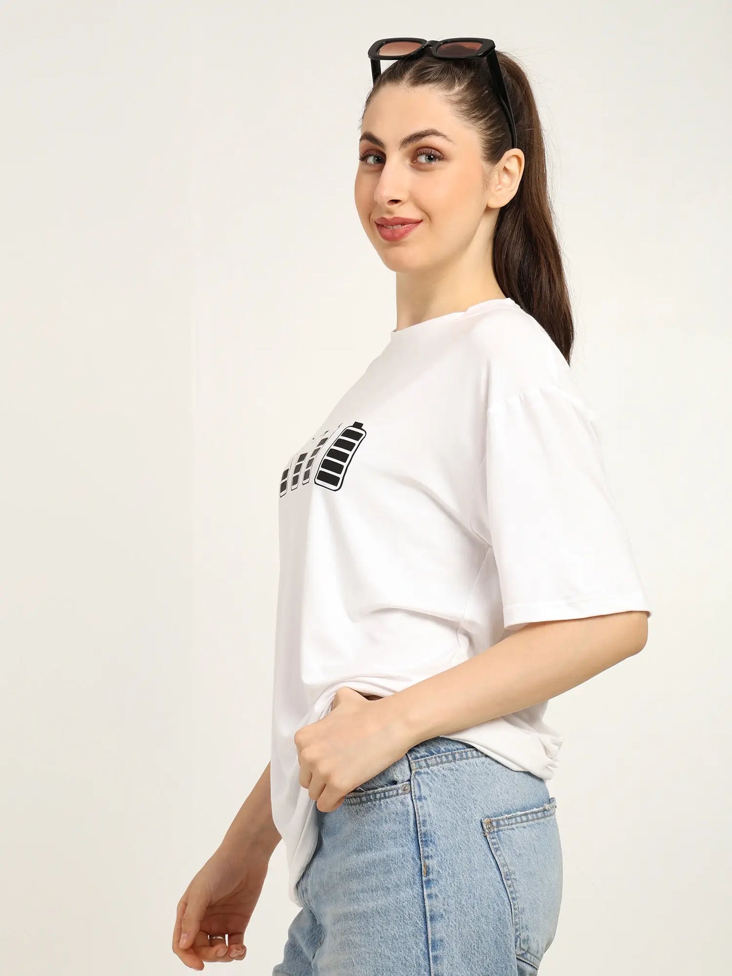 Model showcasing a women oversized bamboo t-shirt in white, ideal for streetwear and sustainable fashion.