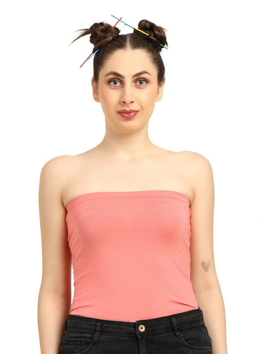 Woman wearing a pink bamboo tube top, showcasing a modern and stylish look for casual occasions.